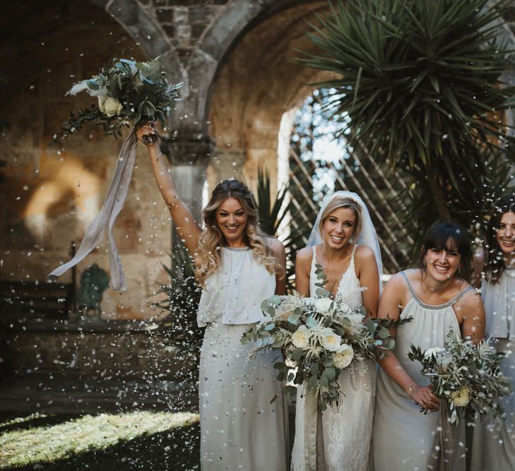 Bridesmaids In Grey Halterneck Dresses // Image By James Frost Photography