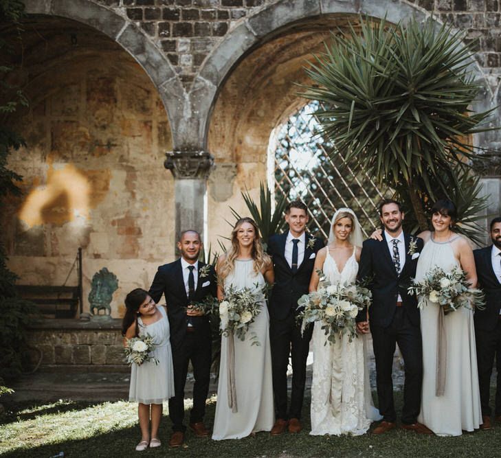 Bridesmaids In Grey Halterneck Dresses // Image By James Frost Photography