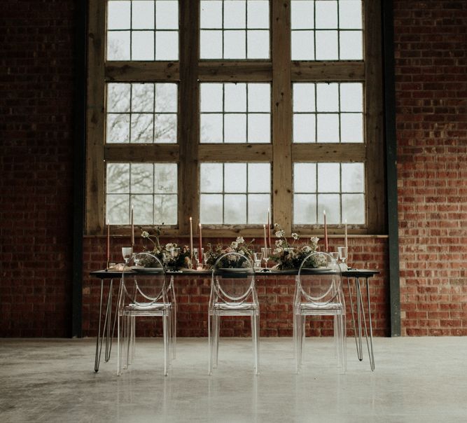 Elegant tablescape at The Giraffe Shed with Ghost chairs and bridal crop top