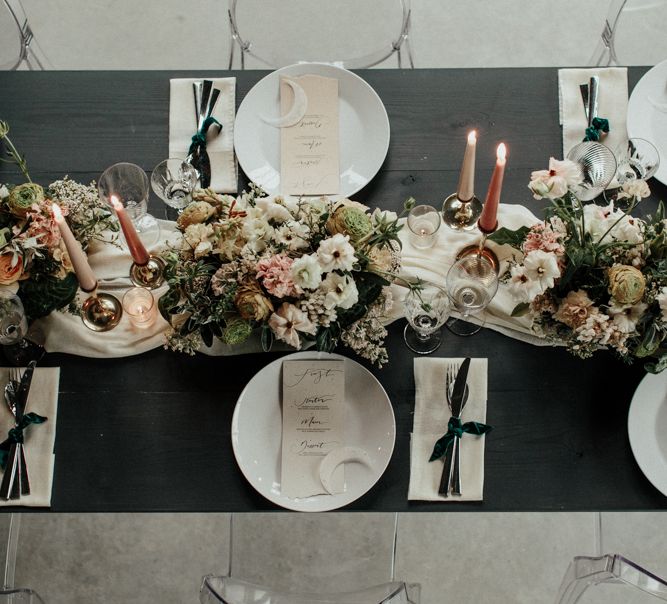 Romantic reception tablescape with flower and candle centrepiece decor