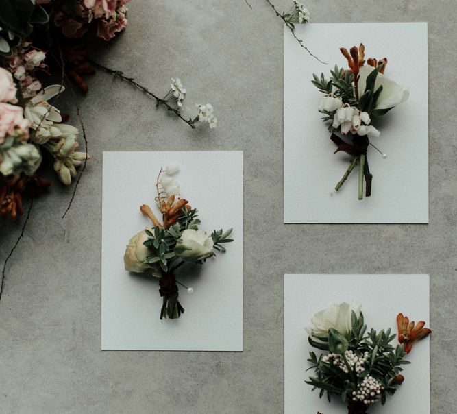 Delicate buttonhole wedding flowers