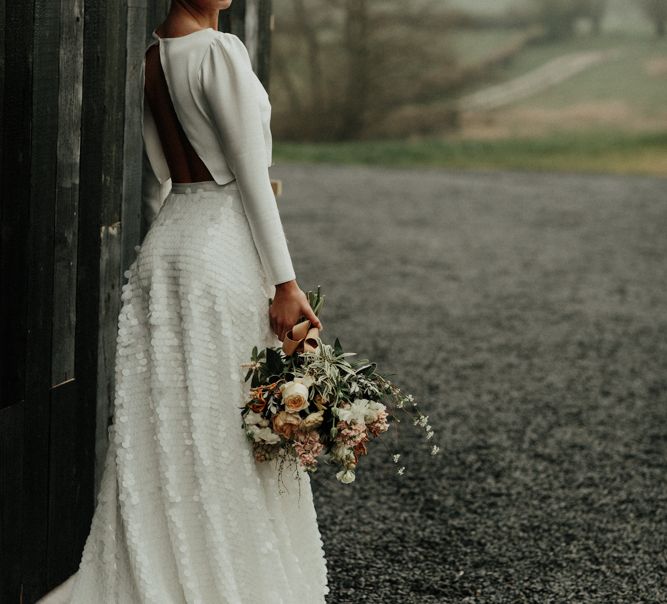 Bridal crop top with open back and long sleeves