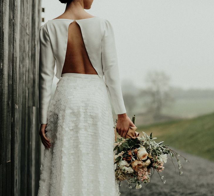 Bridal crop top with open back teamed with a sequin skirt