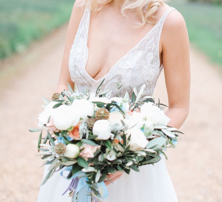 Bride in Tara Keely Bridal Gown | Rachel Simpson Wedding Shoes | Jo Hicks Flowers Pastel Bouquet | Frances  Moore MUA | Effortless French Chic at Hale in Hampshire | Charlotte Wise Fine Art Photography