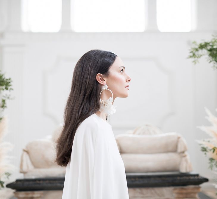 Sleek Wedding Hairstyle  Showing Off Statement Earrings