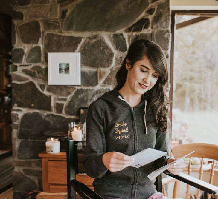 Bride on the Wedding Morning Wearing a Personalised Bride Squad Hoodie