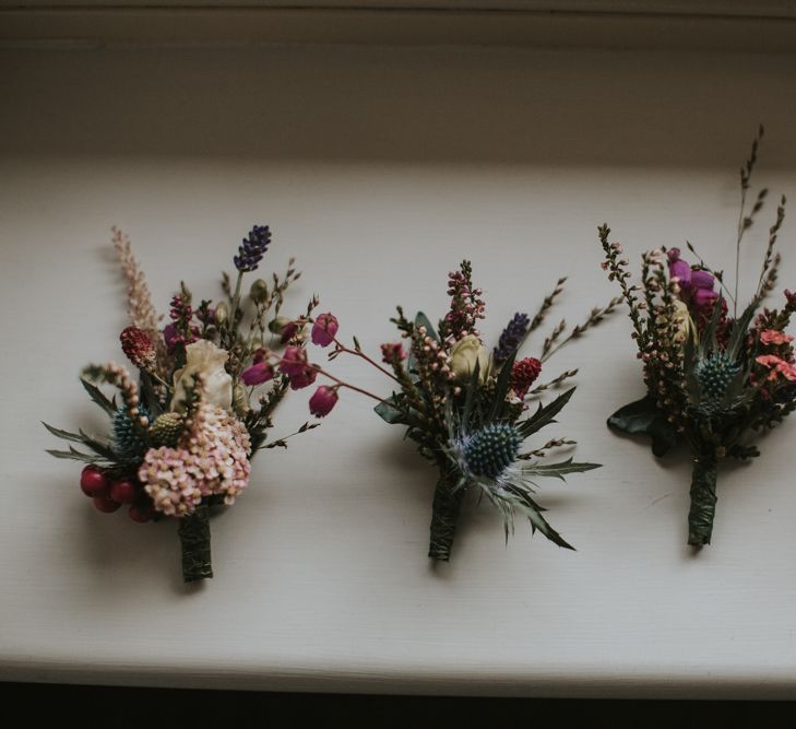 Buttonholes with Deep Red and Green Flowers