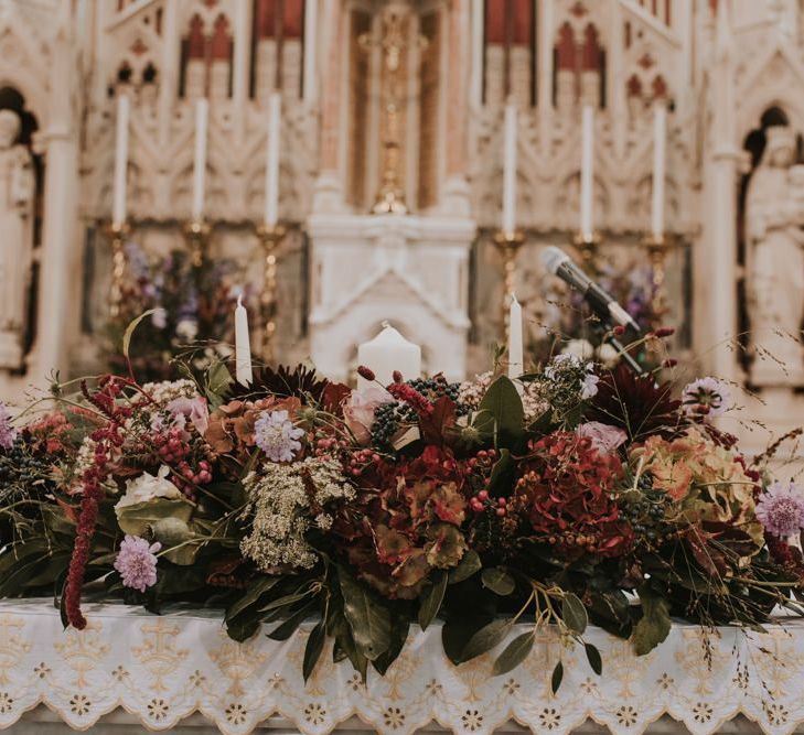 Deep Red and Green Church Altar Flowers