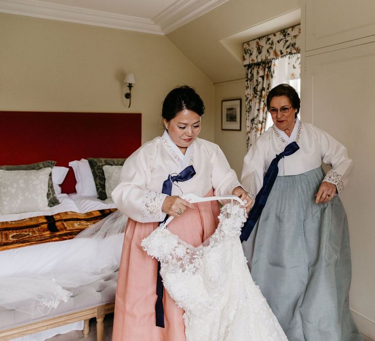 Mother of the bride and groom in tailor-made Hanboks - Korean wedding dress