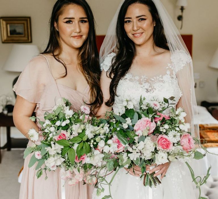 Bride and sister on wedding morning