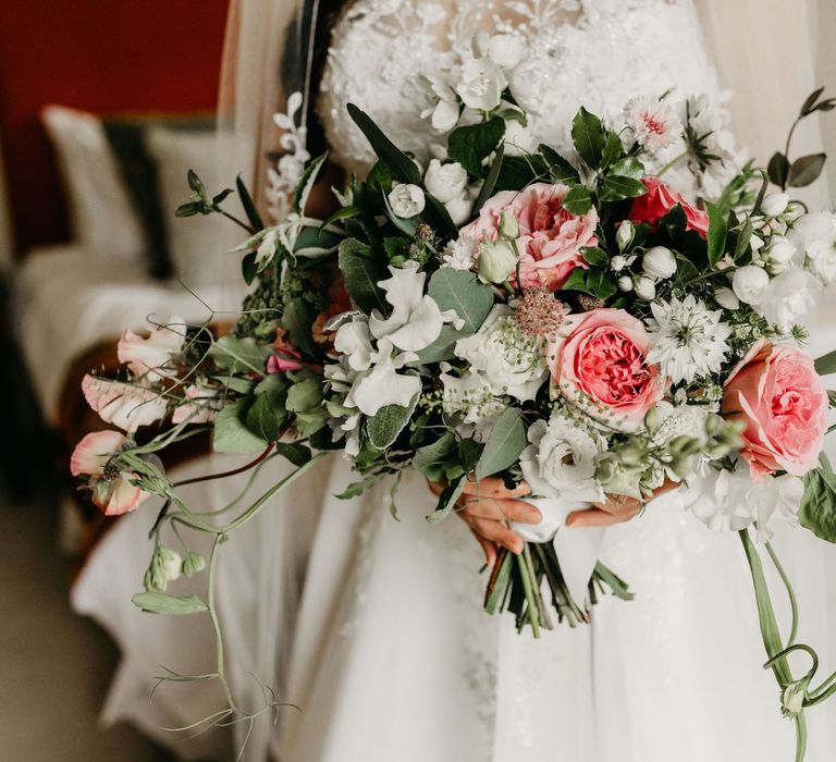 Romantic pink and white flower bouquet with foliage