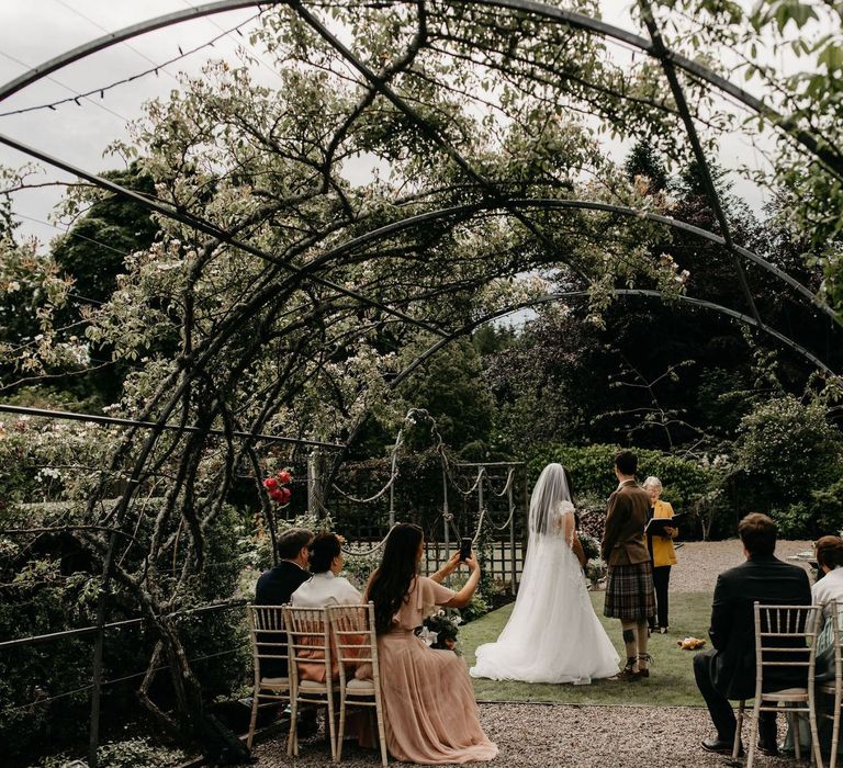 Socially distance wedding ceremony at Elsick House with Korean wedding dress