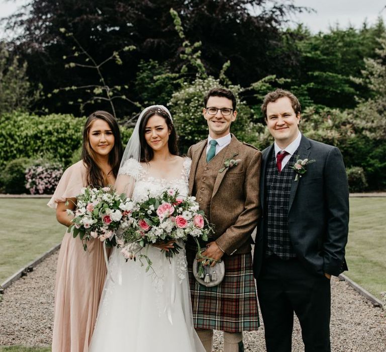 Bride and Groom with their siblings at socially distanced wedding