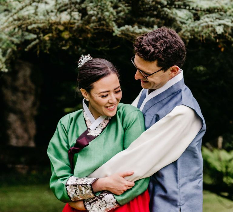 Bride and groom in custom made Hanboks - Korean wedding dress