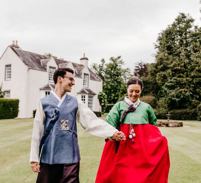 Bride and groom at Micro wedding in Tailor made Korean wedding dress outfits