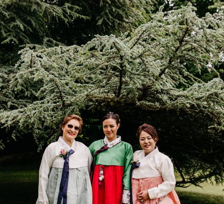 Mother of the bride and groom and bride in tailor made Hanboks - Korean wedding dress