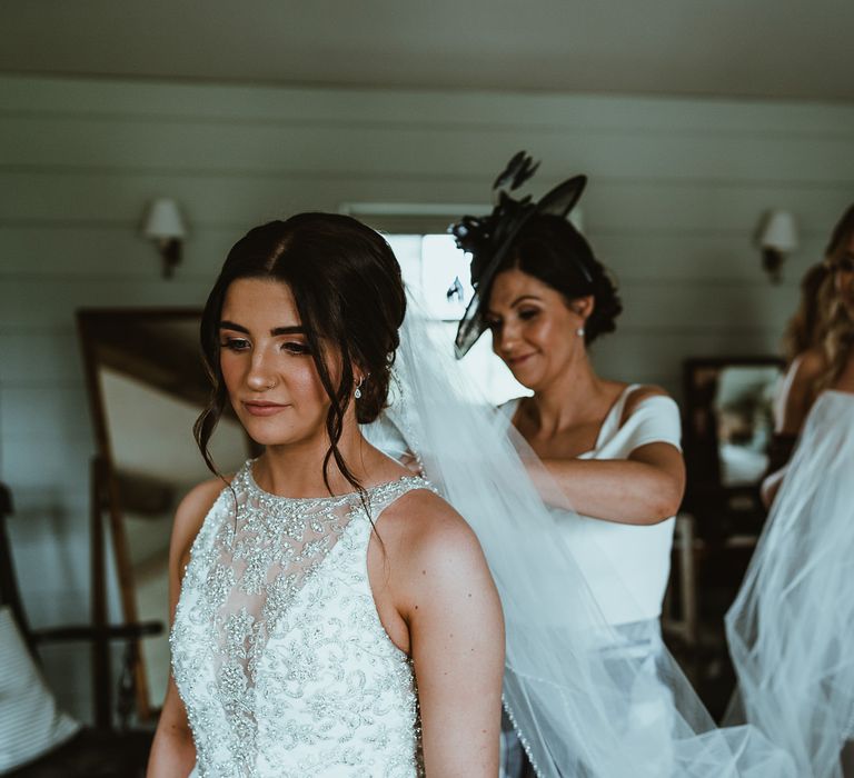 Wedding Morning Bridal Preparations with Bride in Halterneck Maggie Sottero Wedding Dress