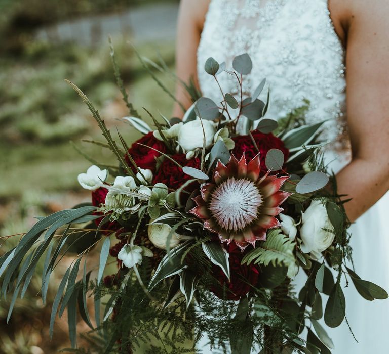 Green and Red Wedding Bouquet with Foliage and Protea Flowers