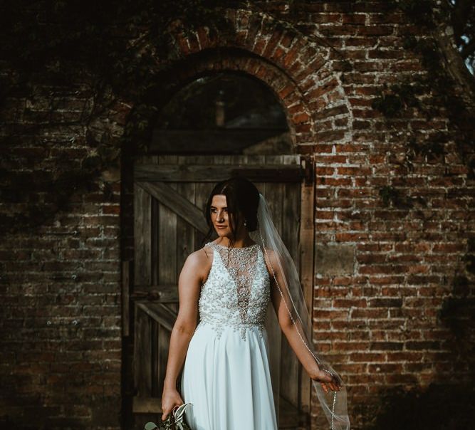 Beautiful Bride in Halterneck Wedding Dress by Maggie Sottero