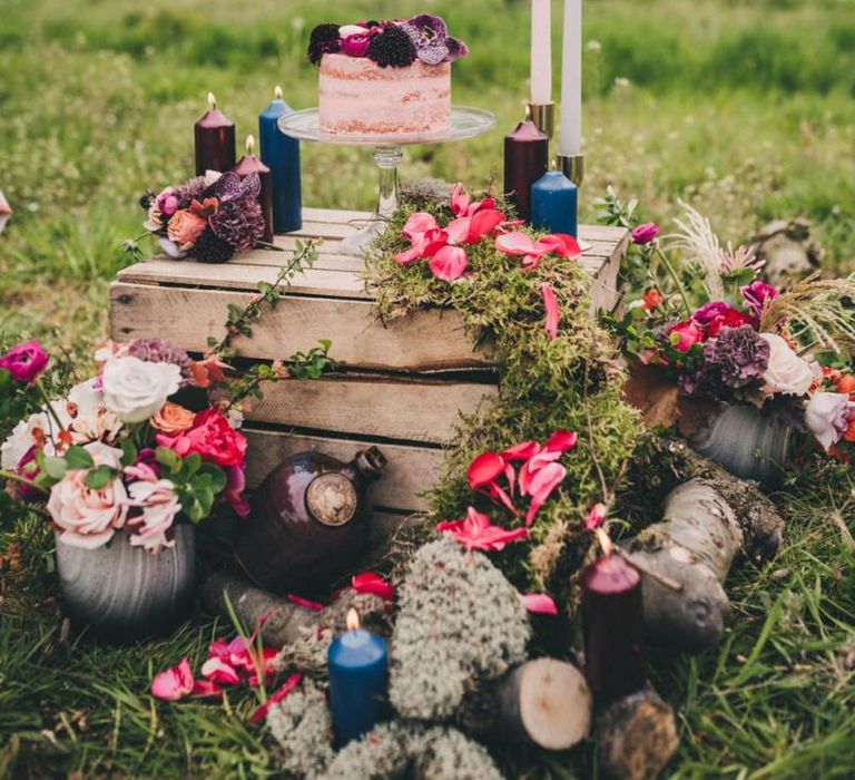 Wooden Crate with Single Tier Cake, Candles and Floral Wedding Decor