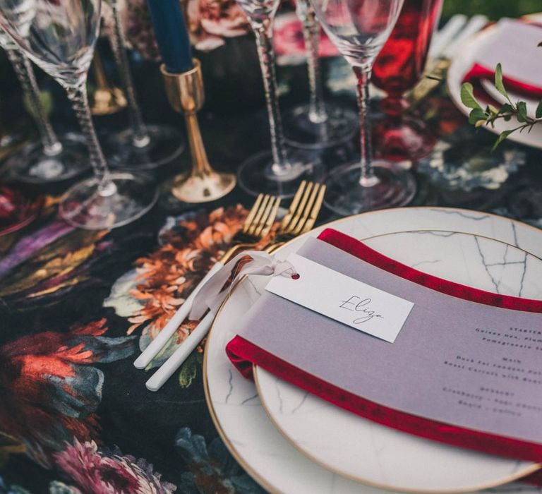 Place Setting with Marble Tableware and Red Napkin