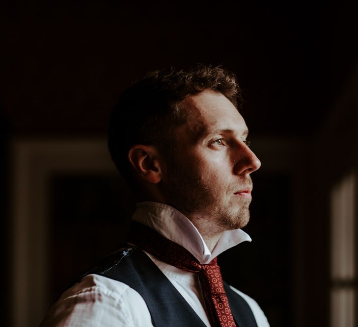 Groom getting ready on wedding morning