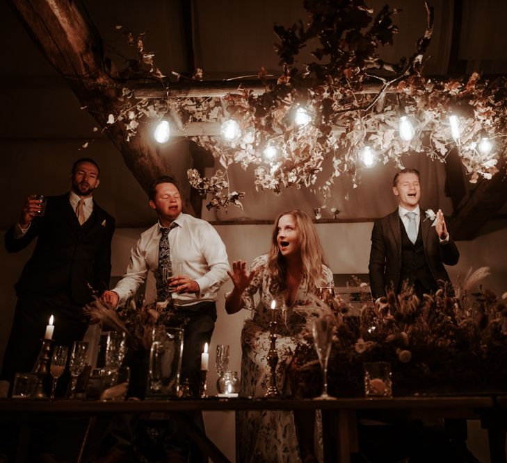 Ladder and dried flower light installation at micro wedding