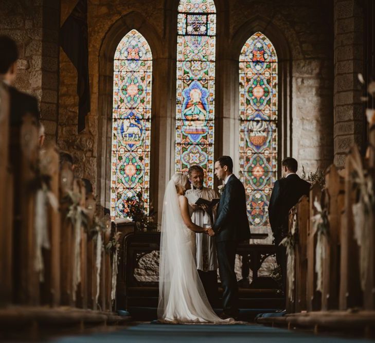 Church wedding ceremony before Teepee for wedding reception