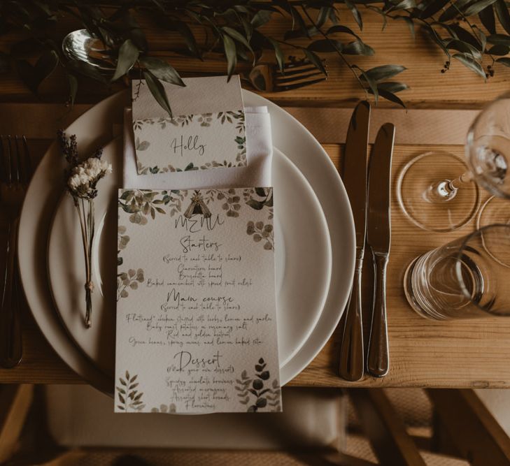 Place setting at teepee wedding