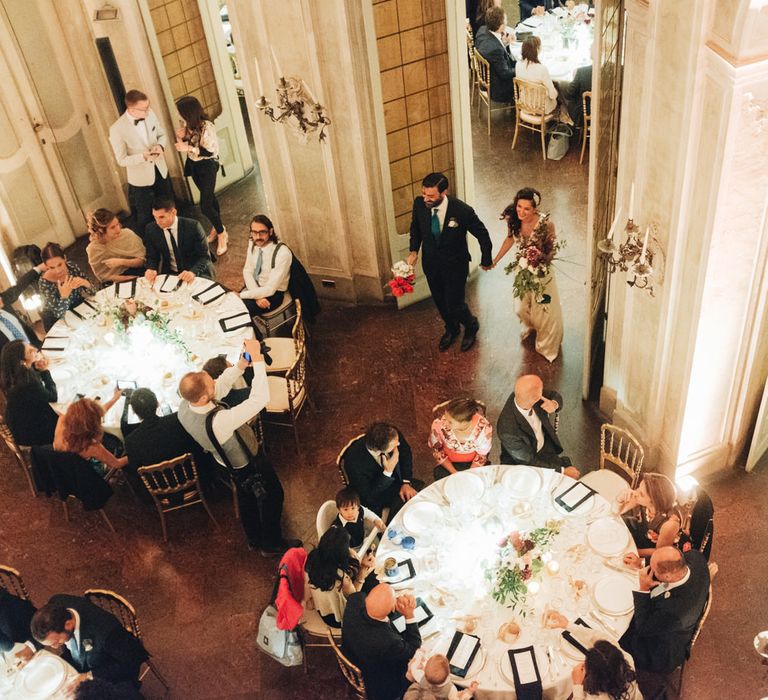 Grand Entrance | Bride in Silk Jenny Packham Gown | Groom in Navy Blue Suit | Glamorous, Roaring Twenties, Great Gatsby Inspired Wedding at Villa Borromeo  in Italy | Matrimoni all’Italiana Photography