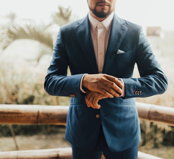 Groom In Navy Suit