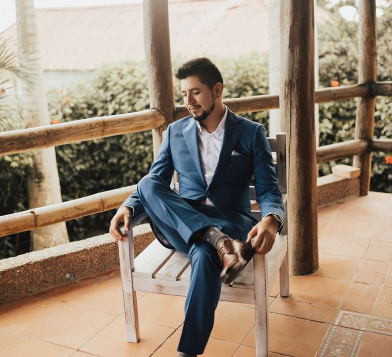 Groom Preparations in Navy Suit