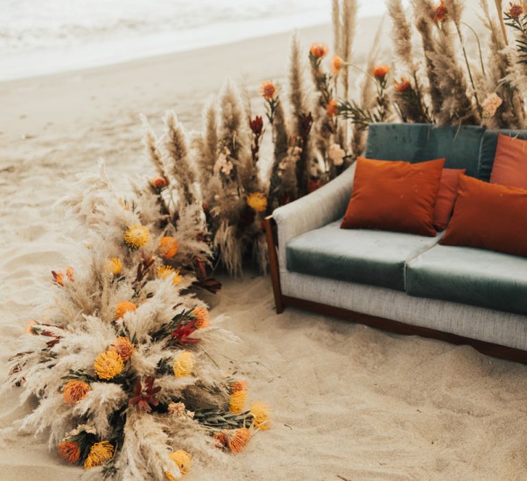 Pampas Grass With Orange Flowers Beach Seating Area