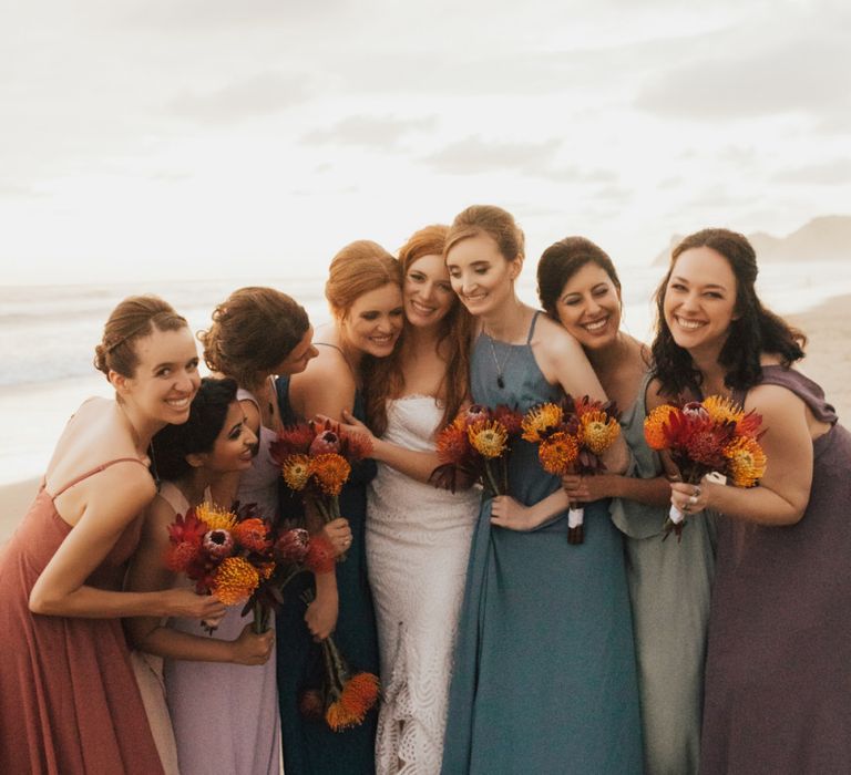 Bridal Party In Colourful Bridesmaid Dresses and Bright Bouquets