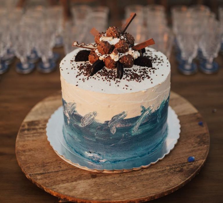 Wedding Cake With Blue Detail and Chocolate Decor