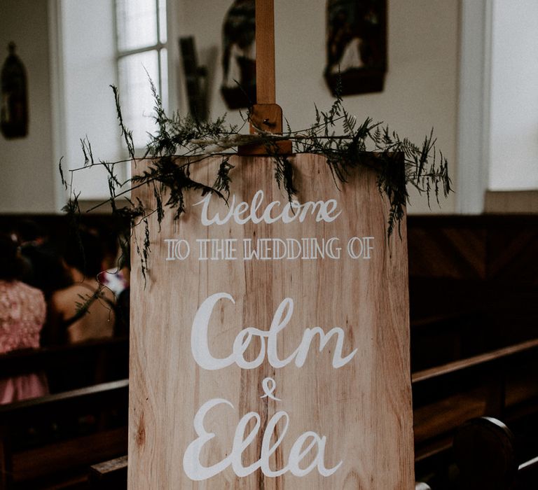 Handmade wooden wedding sign for church ceremony