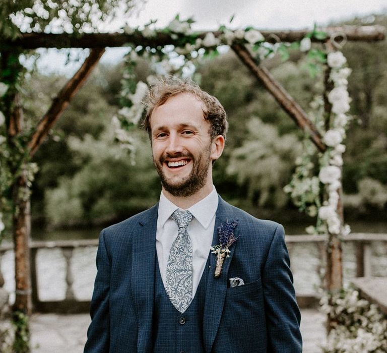 Groom in blue wedding suit