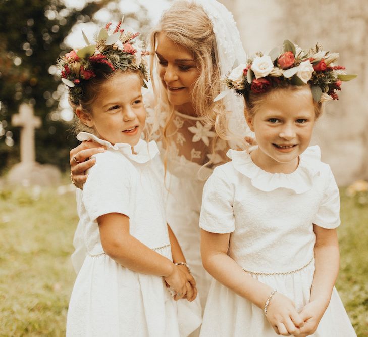 Bride in Eliza Jane Howell wedding dress  with flower girl daughters