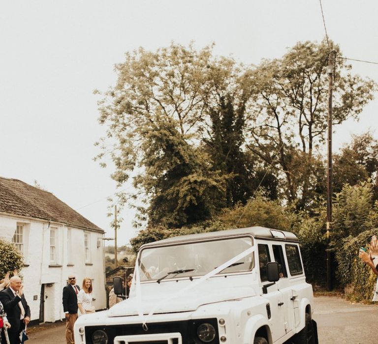 White wedding car at Devon wedding