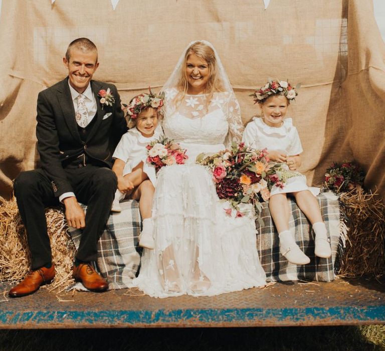 Family portrait with bride in Eliza Jane Howell wedding dress