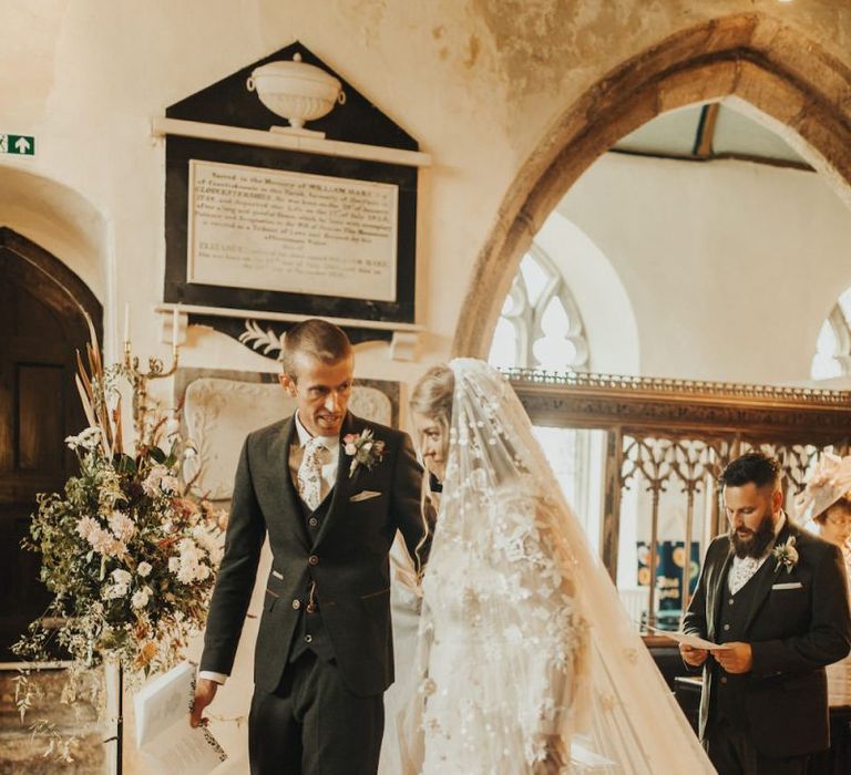 Groom with Bride in Eliza Jane Howell wedding dress