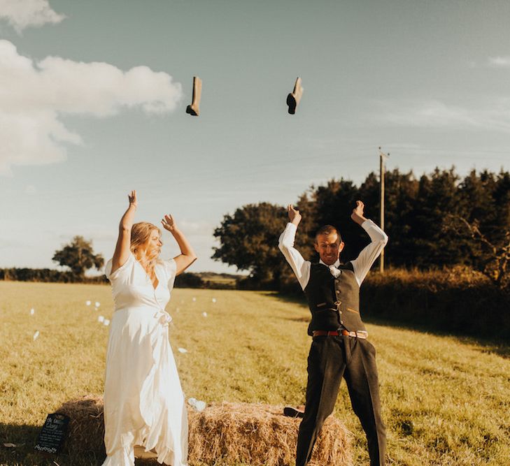 Bride and groom well throwing