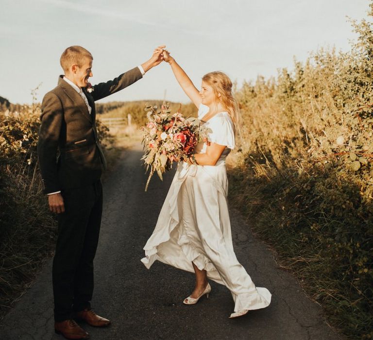 Bride changes from Eliza Jane Howell dress to Ghost wedding dress