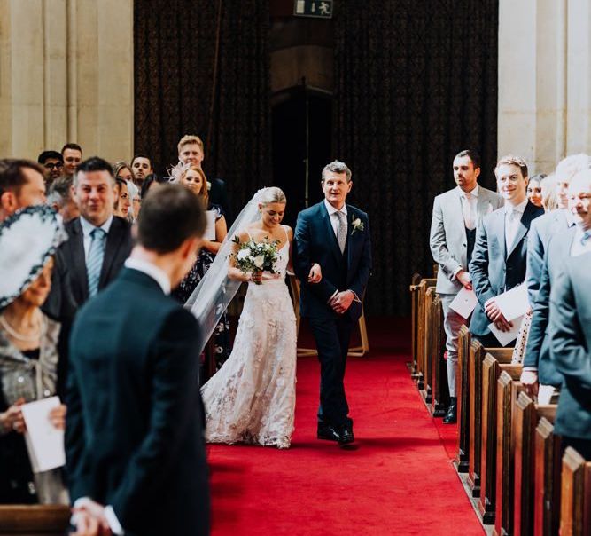 Bride Walking Down the Aisle in Bridal Two Piece