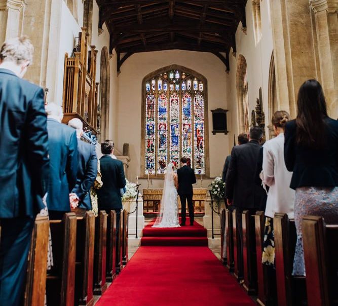 Church Ceremony with Stained Glass Window