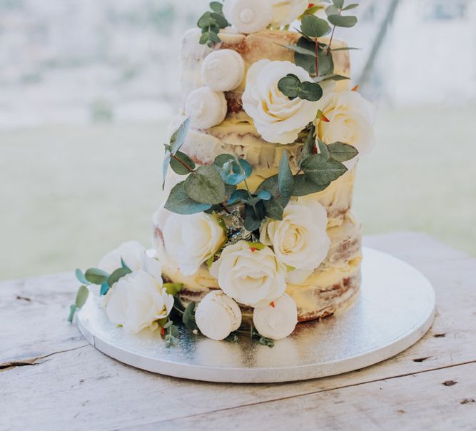 Homemade Semi Naked Rustic Wedding Cake with White Floral Decoration