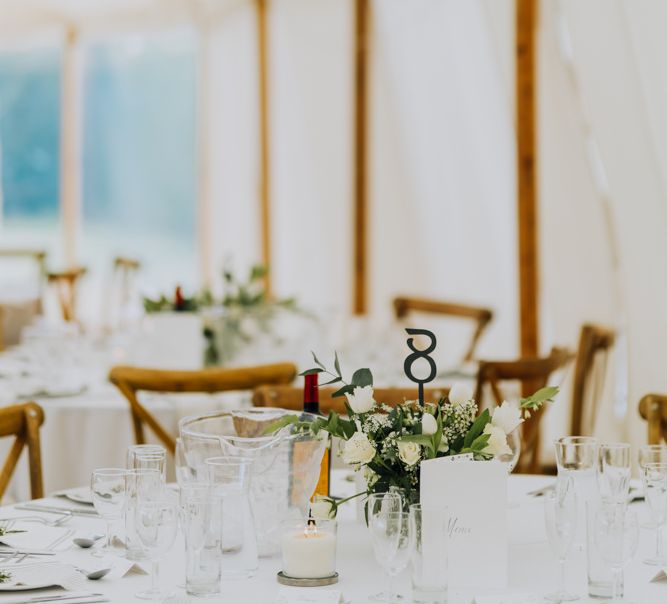 Flower Centre Pieces at Open Sided Marquee Garden Wedding Reception