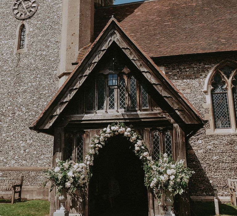 Church Entrance Wedding Flowers with Floral Arch and Arrangements