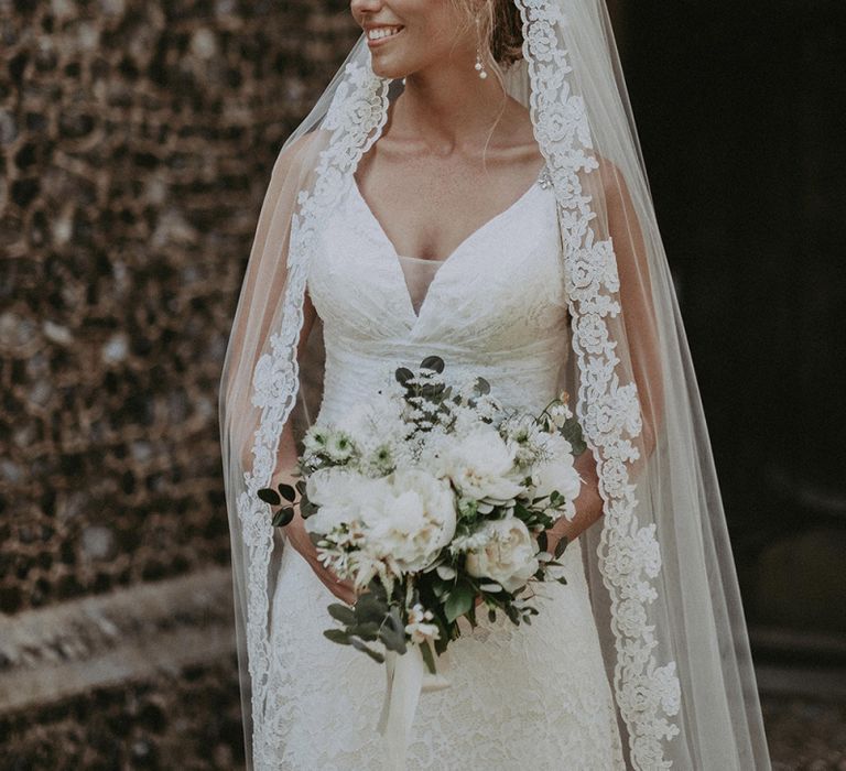 Beautiful Bride in Lace Wedding Dress with Lace Trim Wedding Veil