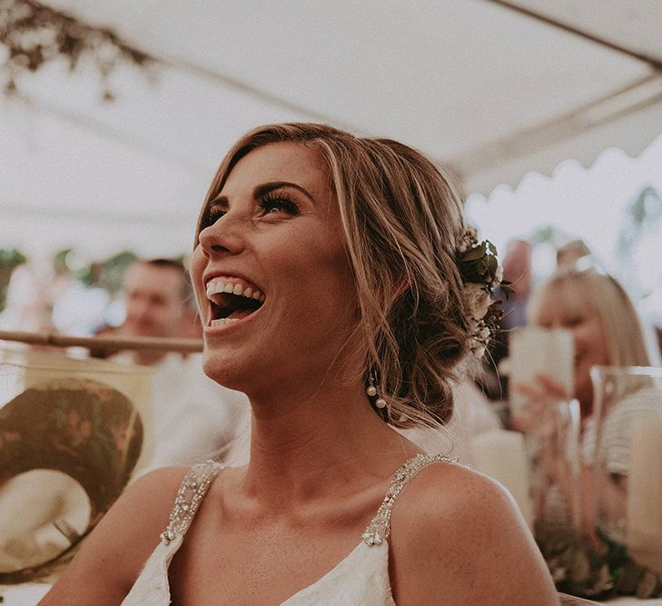 Laughing Bride During Wedding Speeches